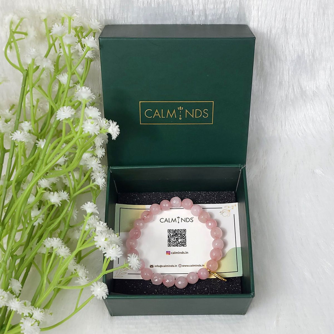 Rose Quartz Healing Bracelet with charm inside claminds box