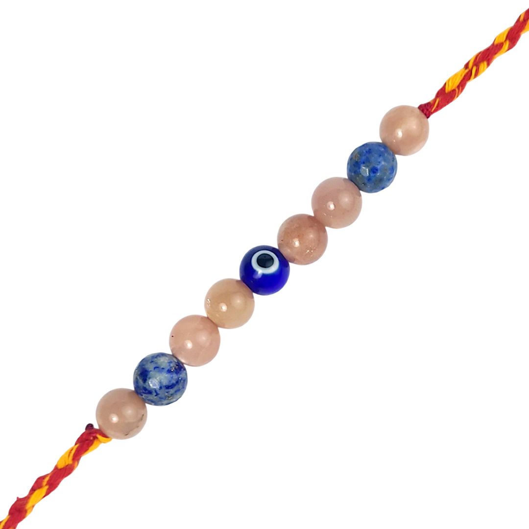rakhi with multicolored beads on a white background