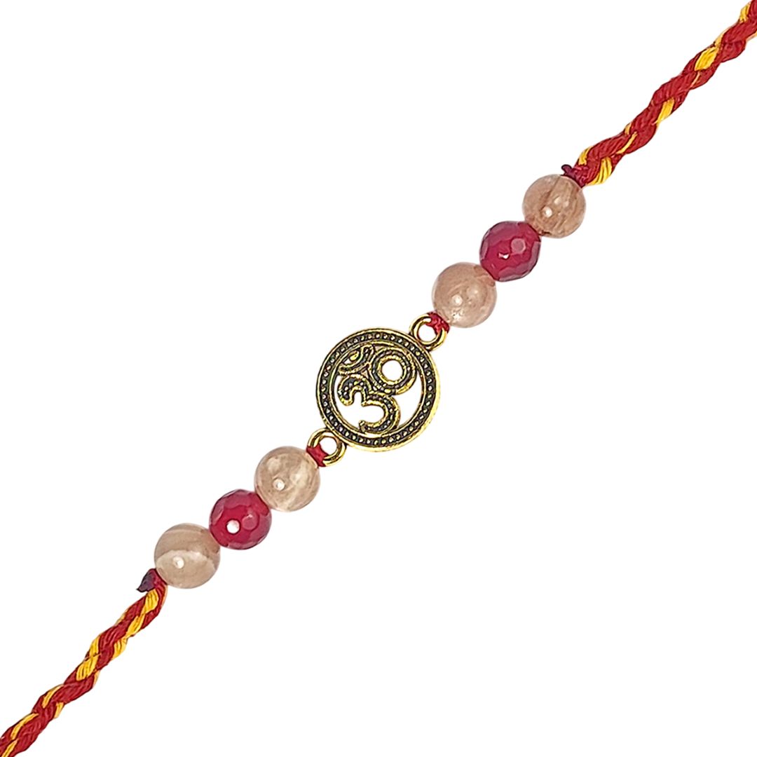 rakhi with beads and Om symbol on a white background