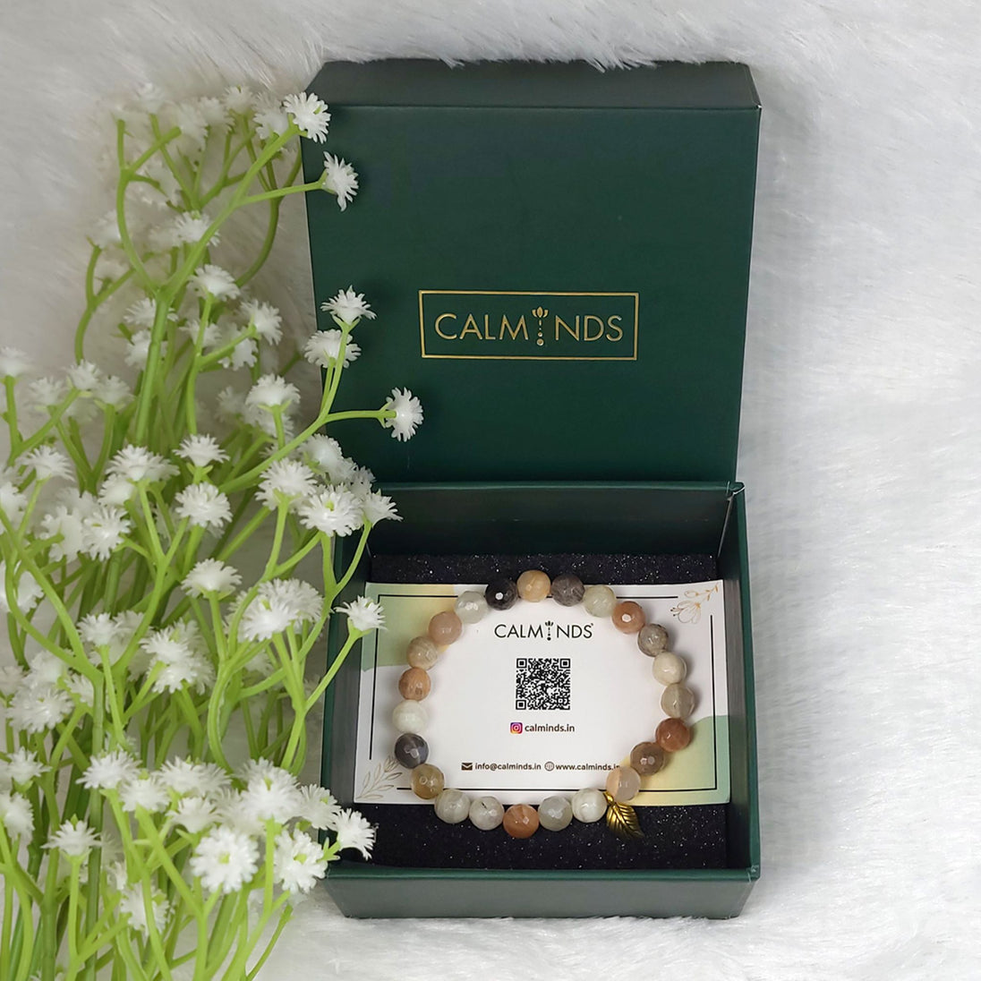 Sunstone Crystal Bracelet inside green calminds box