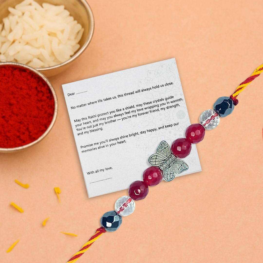 Rakhi with a card on an orange background