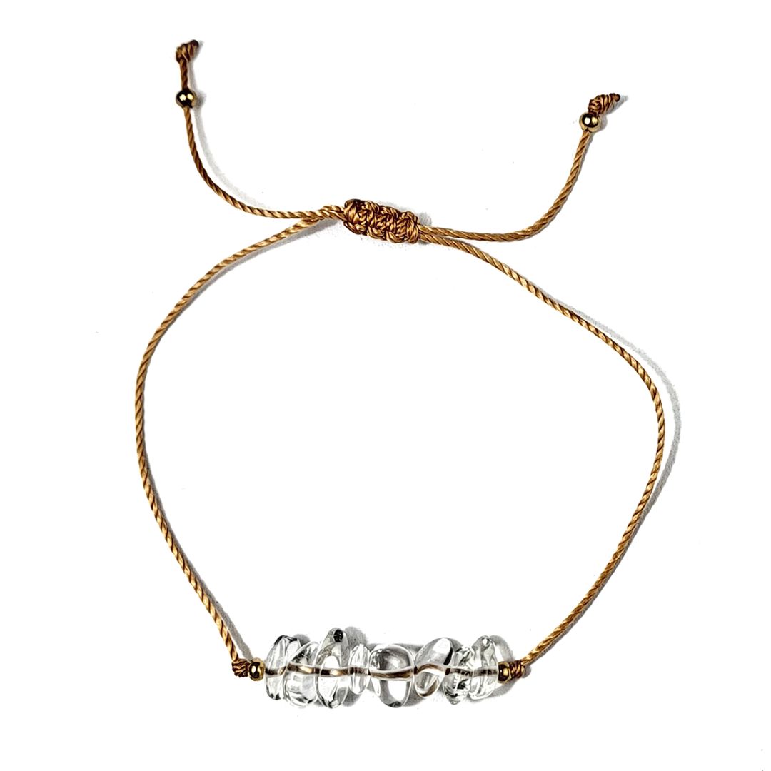 thread bracelet with clear crystal beads on a white background