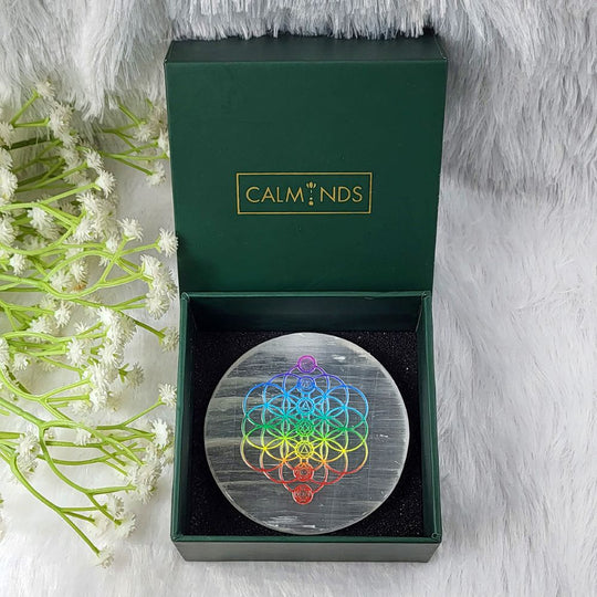 decorative item with flower of lide chakra design in a calminds box on a white background