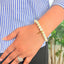 woman wearing a Selenite Crystal bracelet on her left hand