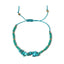Turquoise beaded bracelet with golden thread on a white background