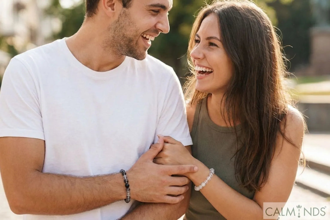 Happy young couple wearing complementary crystal bracelets, meaningful Valentine's gift for boyfriend.