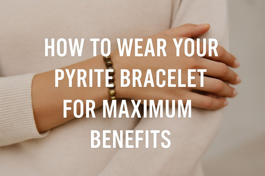 woman hand with pyrite bracelet on and white colour text written on top