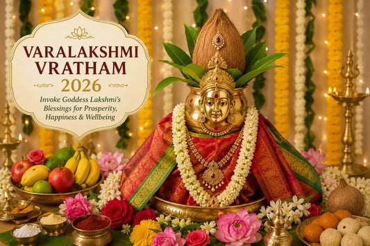 Varalakshmi Vratham 2026 Kalasha decorated with Goddess Lakshmi, coconut, mango leaves, flowers, and traditional pooja setup.