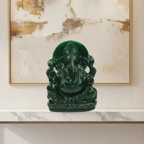 god idols banner with lord ganesha murti of green color