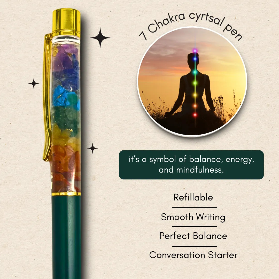 7 Chakra Crystal Ball Pen Green Edition held in hand while writing