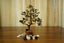 Black Obsidian Crystal Tree surrounded by white and black pebbles