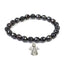 Calminds Black Tourmaline Healing Bracelet with silver charm on it