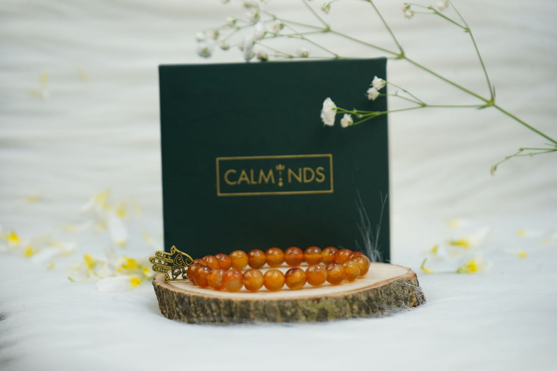 orange color Carnelian Healing Bracelet  with a box behind