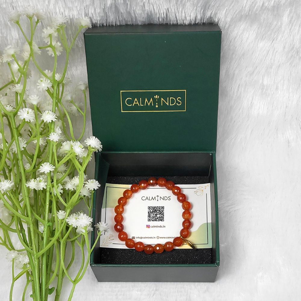 carnelian bracelet with open box of calminds