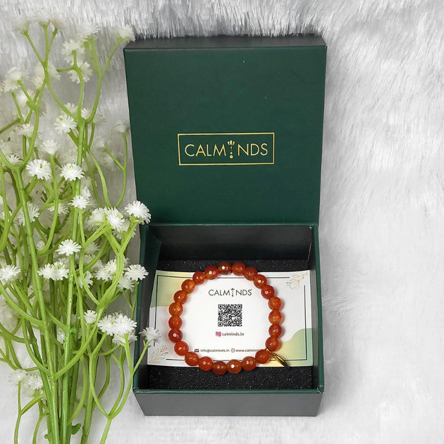 carnelian bracelet with open box of calminds