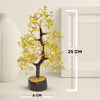 Decorative tree with yellow leaves and a measurement scale on a beige background