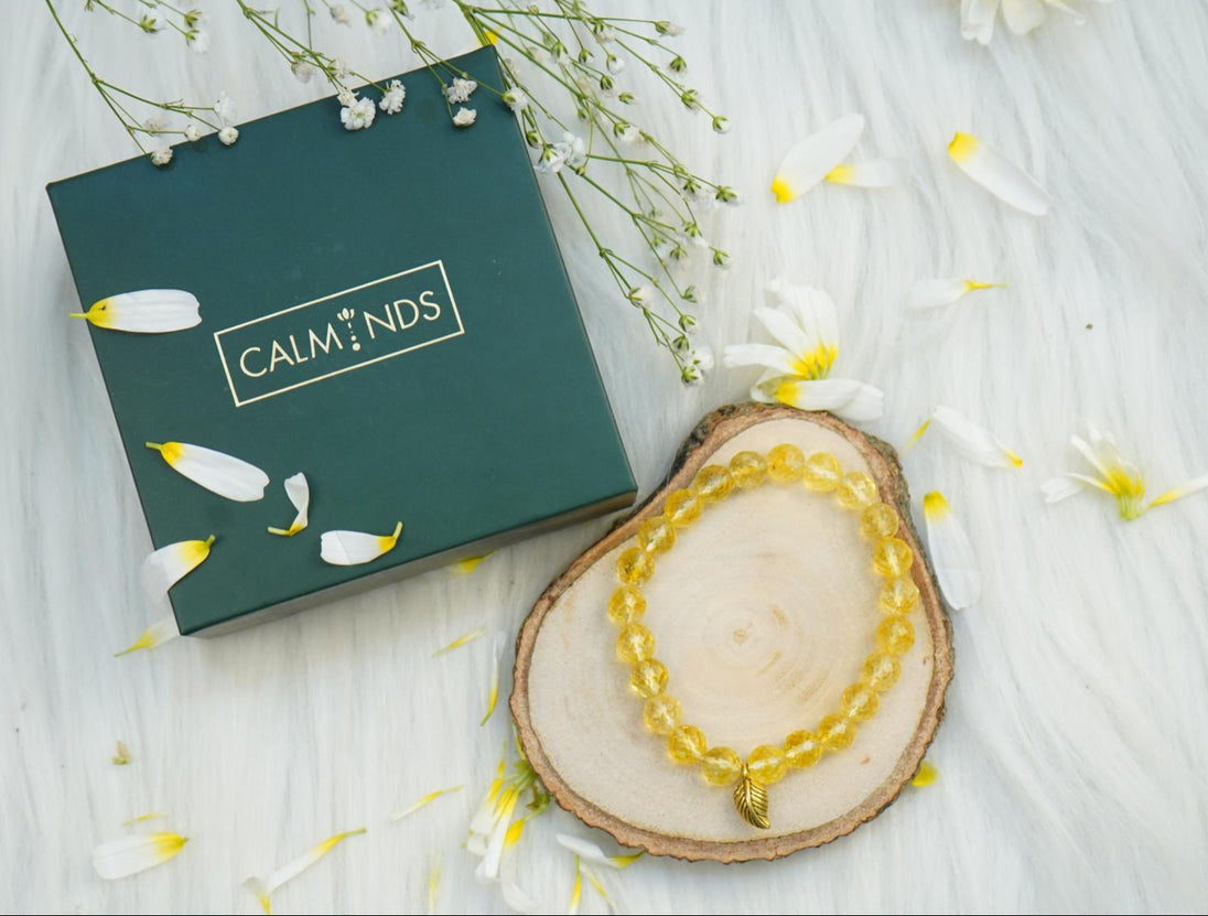 Yellow Citrine Crystal Bracelet with a box next to it