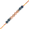 rakhi with blue and pink beads on a white background