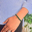 woman wearing a Green Aventurine Bracelet on her left hand