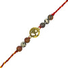 rakhi with beads and a gold charm on a white background