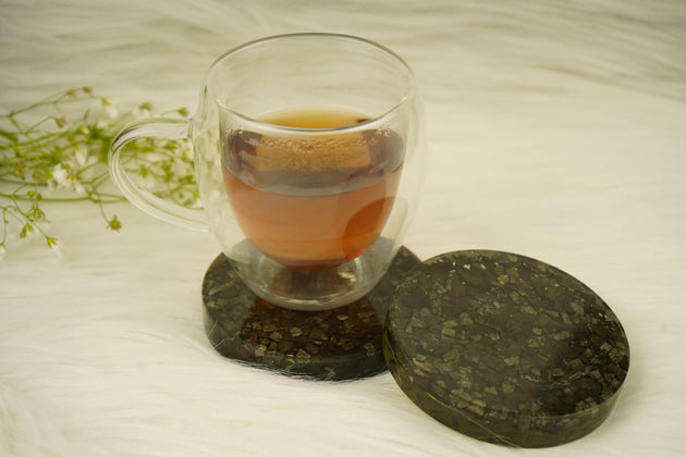 pyrite orgonite coaster pair with cup on top