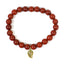 Red Jasper Healing Bracelet with a golden leaf petal and white background