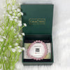 Rose Quartz Crystal Bracelet of pink color inside green calminds box