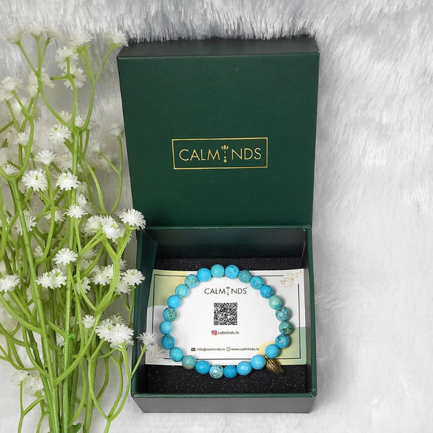 Turquoise Leaf Charm Bracelet inside a box