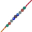 Necklace with colorful beads and a red string on a white background