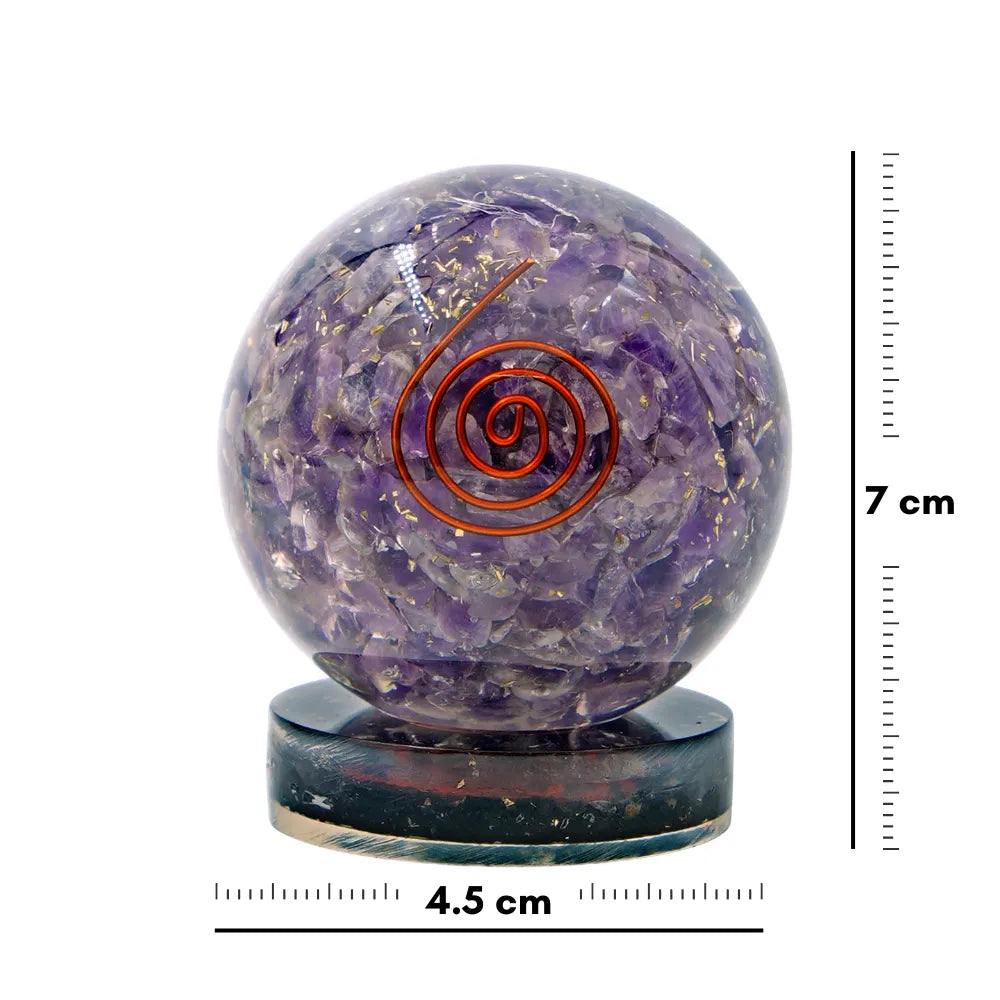 Crystal sphere with a spiral design on a white background with measurement scale