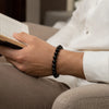 Black Onyx Crystal Bracelet for men, worn on wrist
