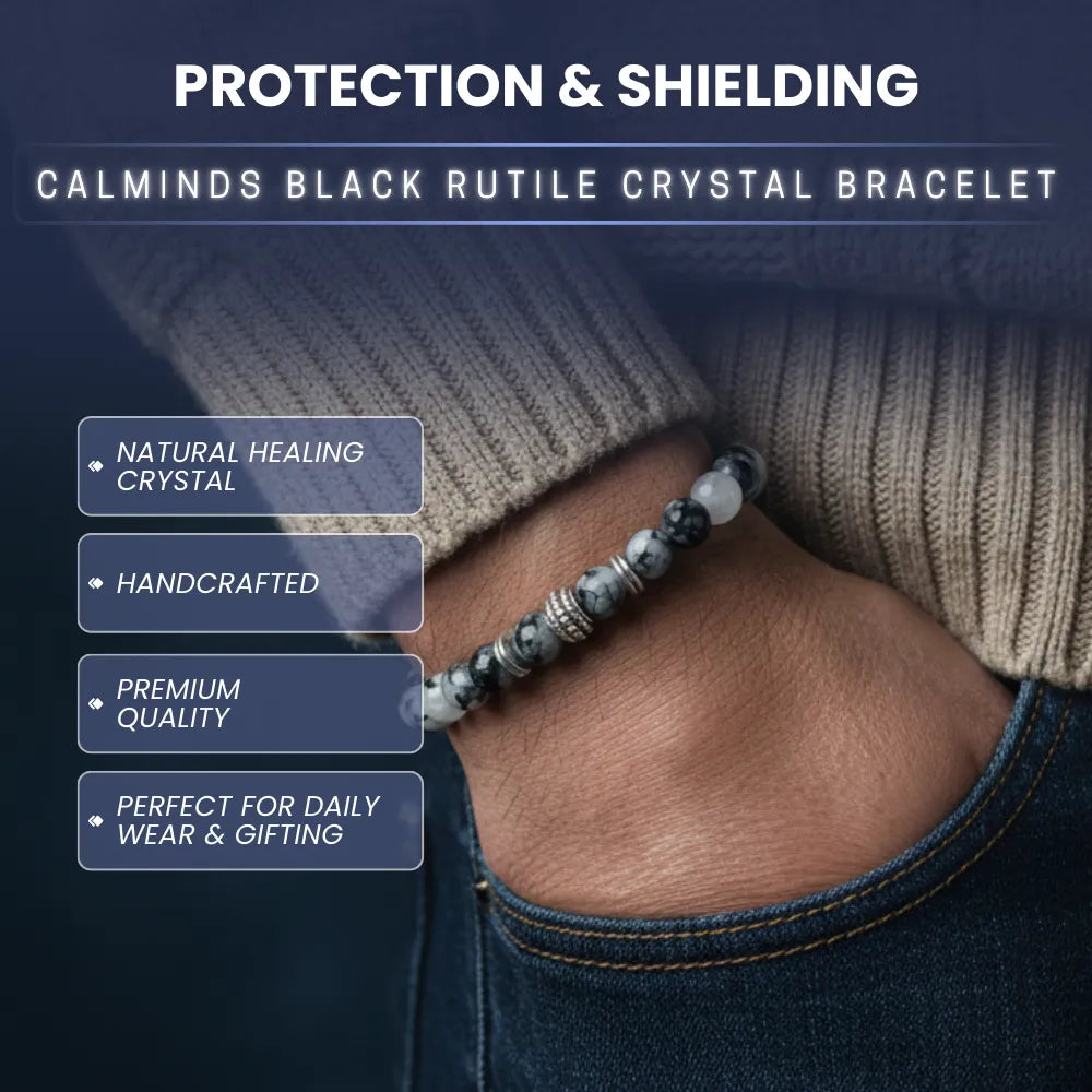 Person wearing a black rutile crystal bracelet with product features listed on a dark background