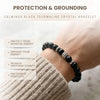 Black tourmaline crystal bracelet on a wrist with text about its benefits.