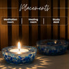 Two blue mosaic candle holders with a lit candle on a wooden surface, labeled for meditation room, healing room, and study desk.
