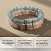 Stack of pink and blue beaded bracelets on a beige surface with text instructions.
