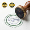 Rubber stamp with 'Calminds' branding on a white background, featuring ISO and authenticity seals.