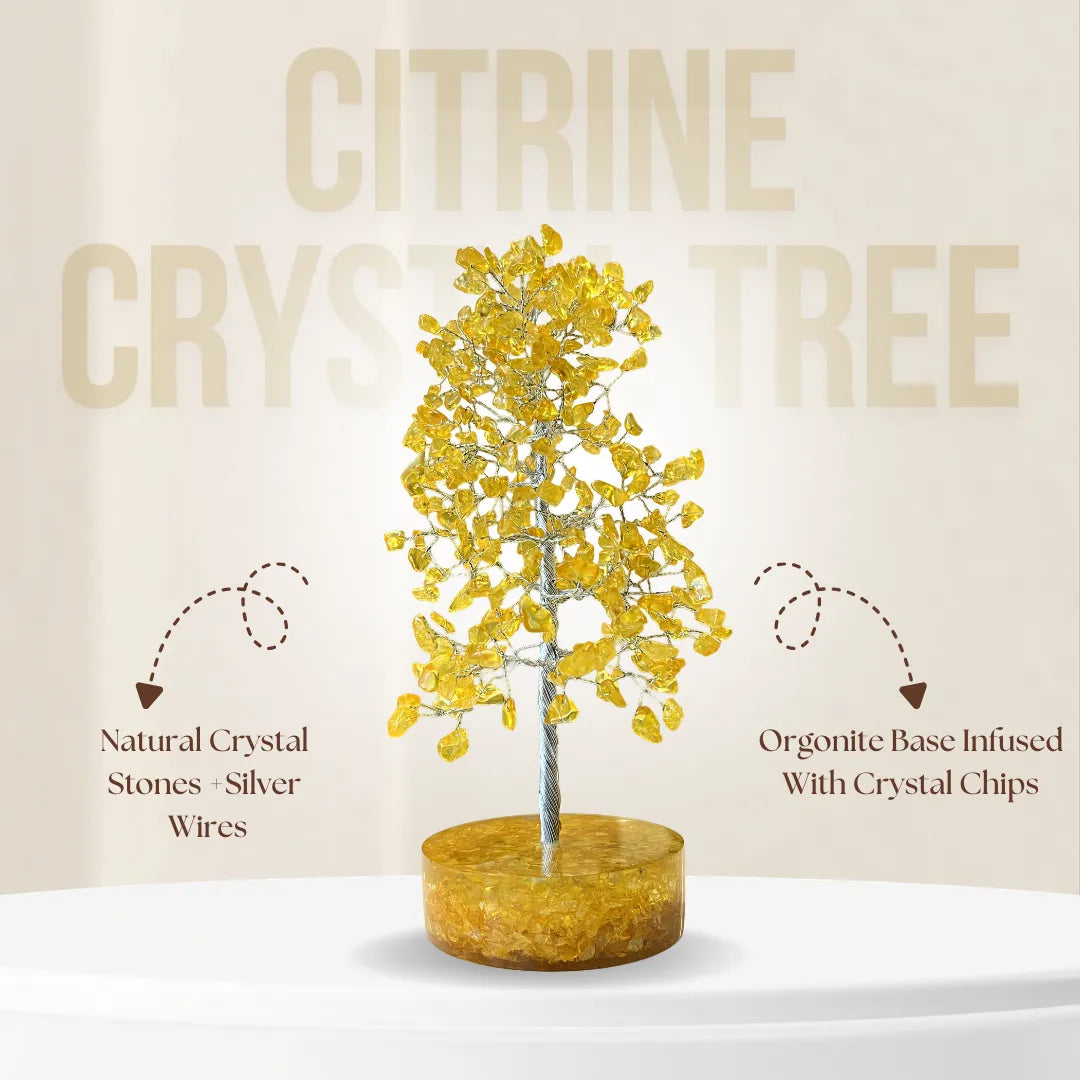 Citrine crystal tree with natural crystal stones and silver wires on a beige background