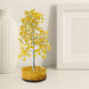Decorative tree with yellow leaves on a white background