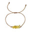 Bracelet with yellow beads on a white background