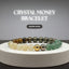 Crystal money bracelet featuring citrine, pyrite, tiger’s eye, green aventurine, and hematite beads