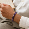 Cylindrical amethyst bracelet detail for everyday styling