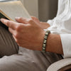 Cylindrical pyrite bracelet detail for everyday styling