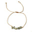 bracelet with dalmatian jasper stone beads on a white background