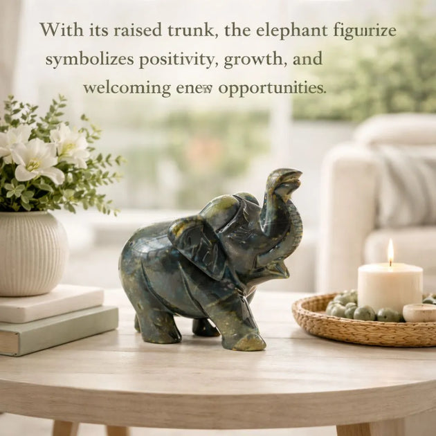 Decorative elephant figurine on a table with text about its symbolism