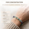 Fluorite crystal bracelet on a wrist with text about its benefits for concentration.