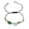 Bracelet with beads and a butterfly charm on a white background