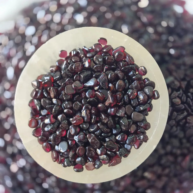 Red garnet stone chips close-up