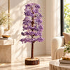 Grand Amethyst Crystal Tree with dense purple stone chips on a wooden log base