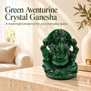 Hand-carved green aventurine Ganesha idol on a marble table