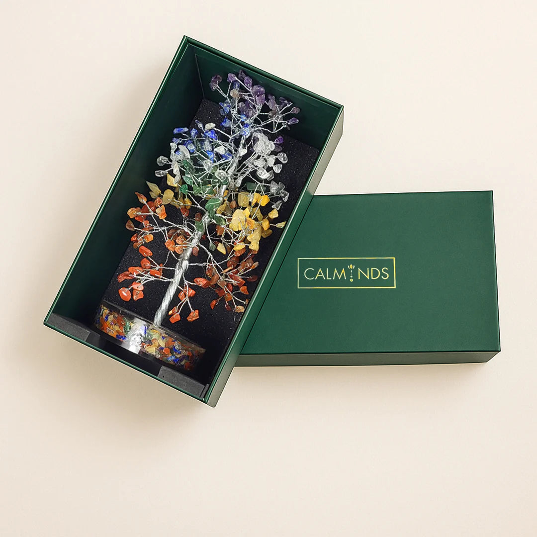 seven chakra crystal tree in a green box with 'Calminds.'